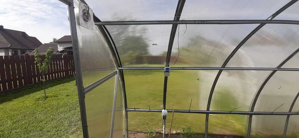 Greenhouse temperature controller connected to automatic ventilation fan
